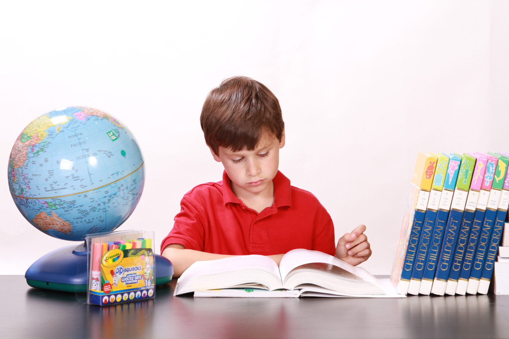 Canva-Little-Boy-Reading-a-Book-2048x1365.jpg