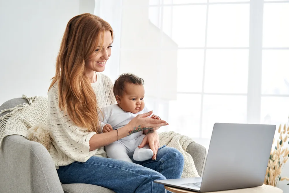 Image of baby watching Ms. Rachel, a good show for babies.